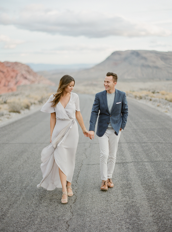 Fashionable bride with large straw hat lace cover up on yacht - Greg Finck  Photography